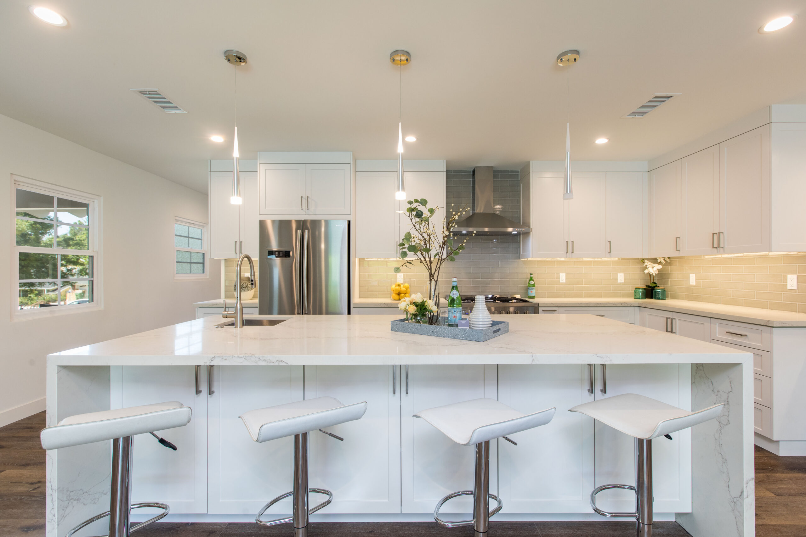 Wide-angle kitchen with custom cabinetry by ATA Custom Cabinets, Los Angeles