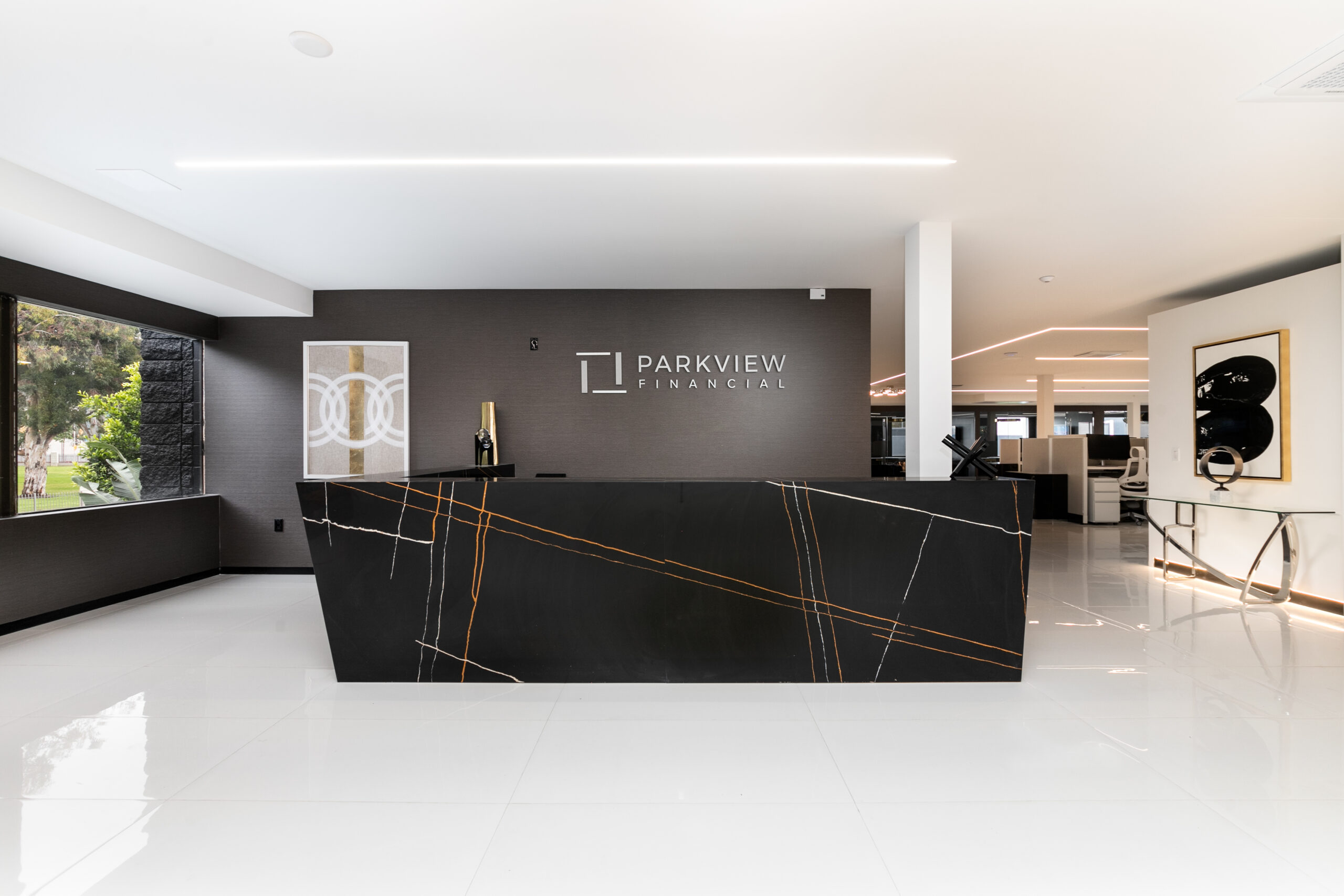 Custom reception desk and lobby cabinetry by ATA Custom Cabinets, Los Angeles