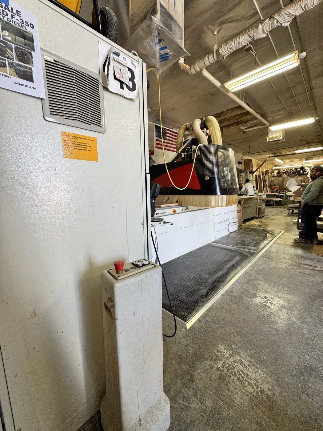 CNC machine running in ATA Custom Cabinets shop, Canoga Park Los Angeles